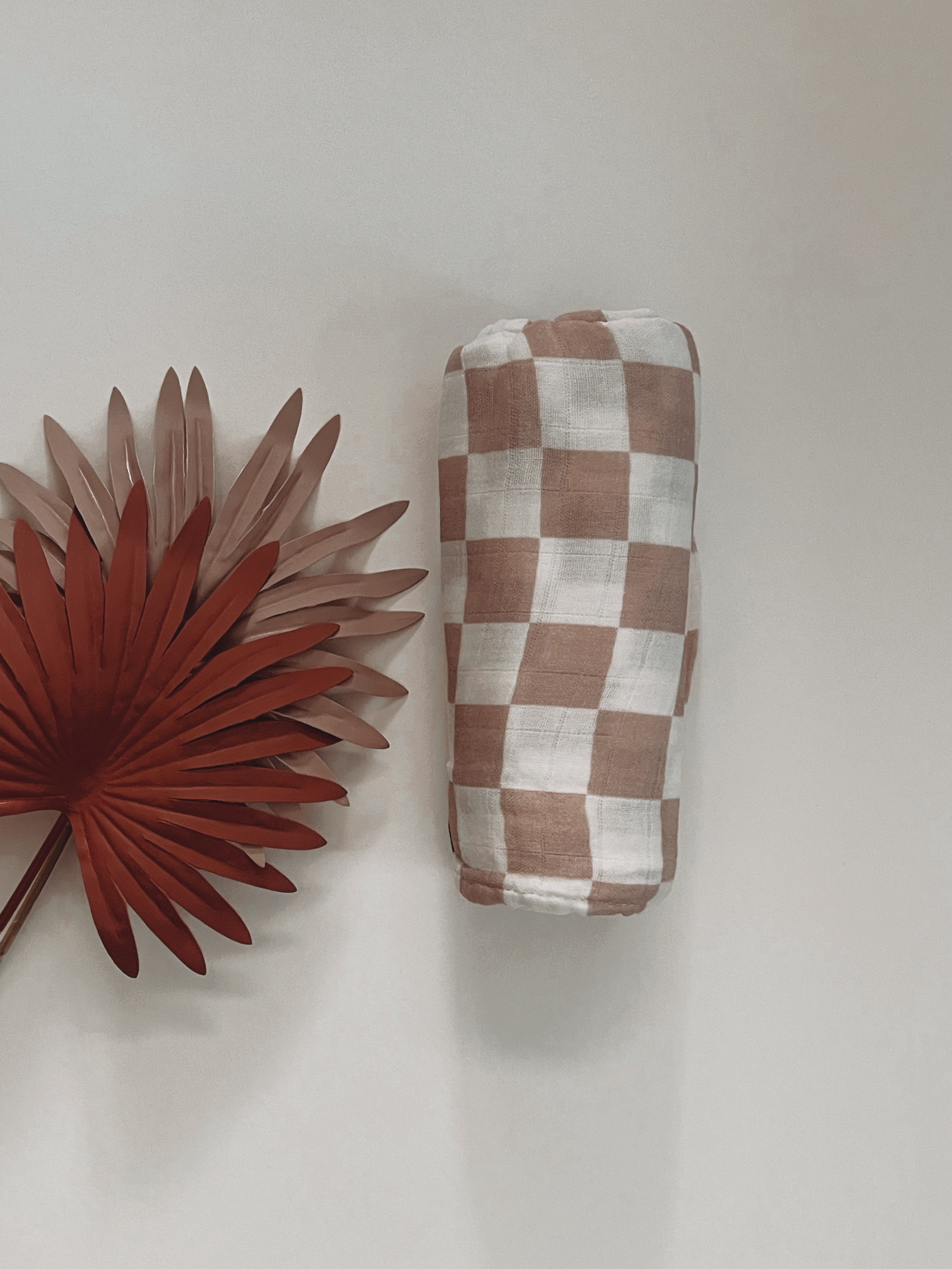 Tan checkered swaddle
